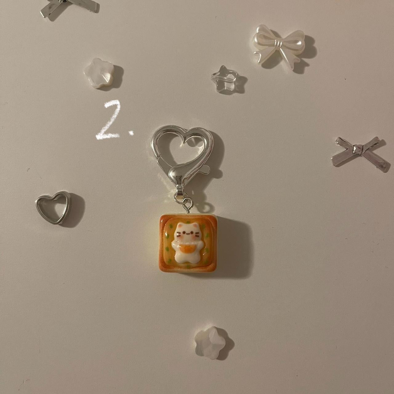 ceramic cat keychains!