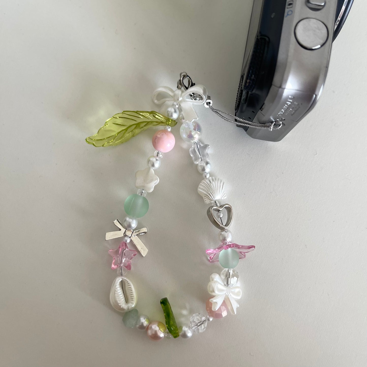 pink + green digital camera strap!