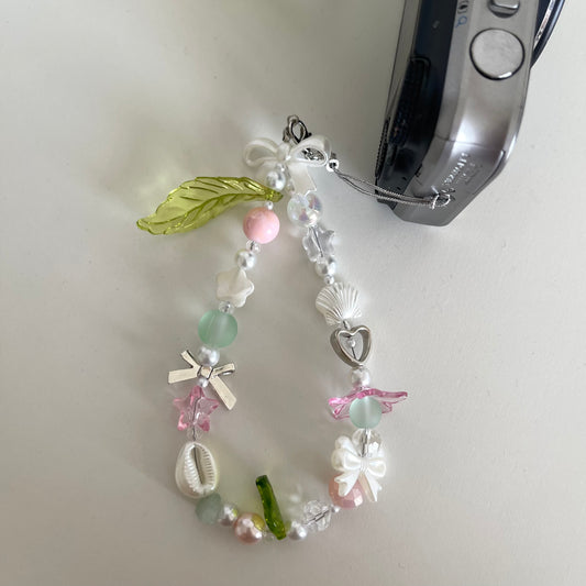 pink + green digital camera strap!