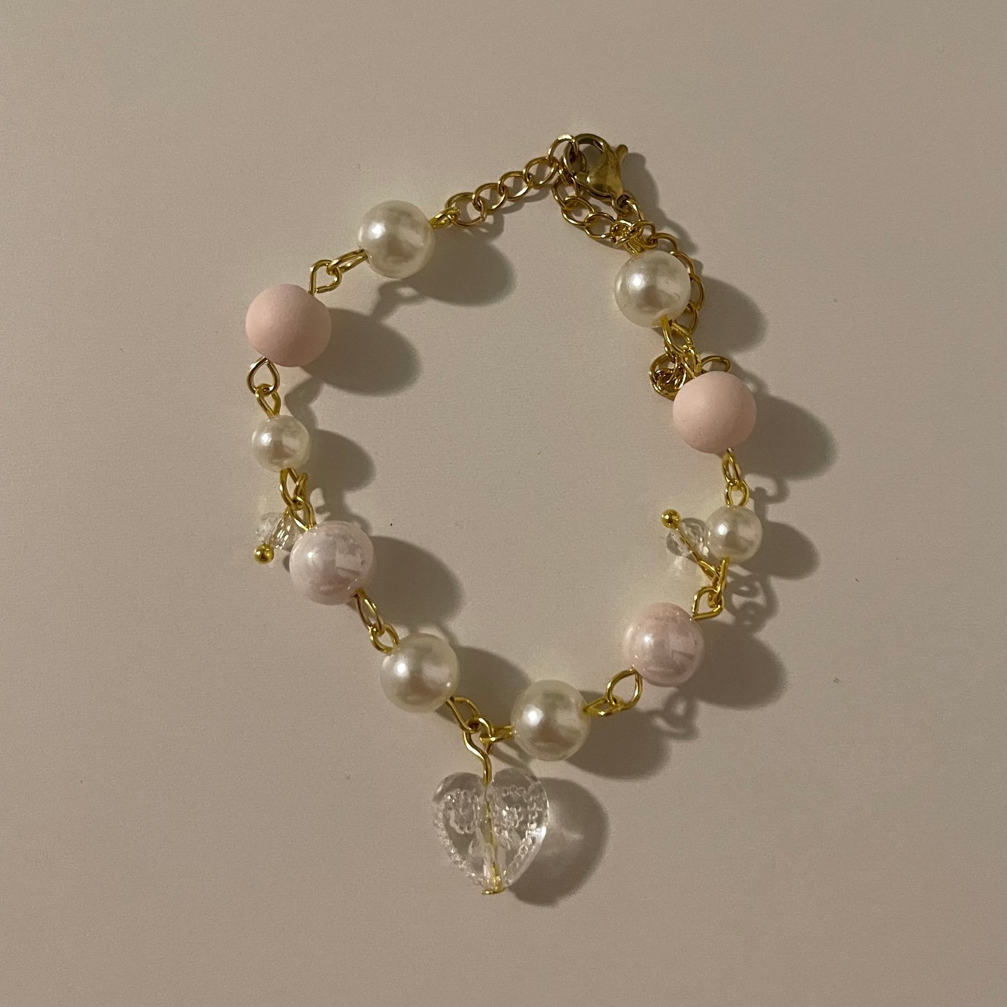matching golden heart bracelets