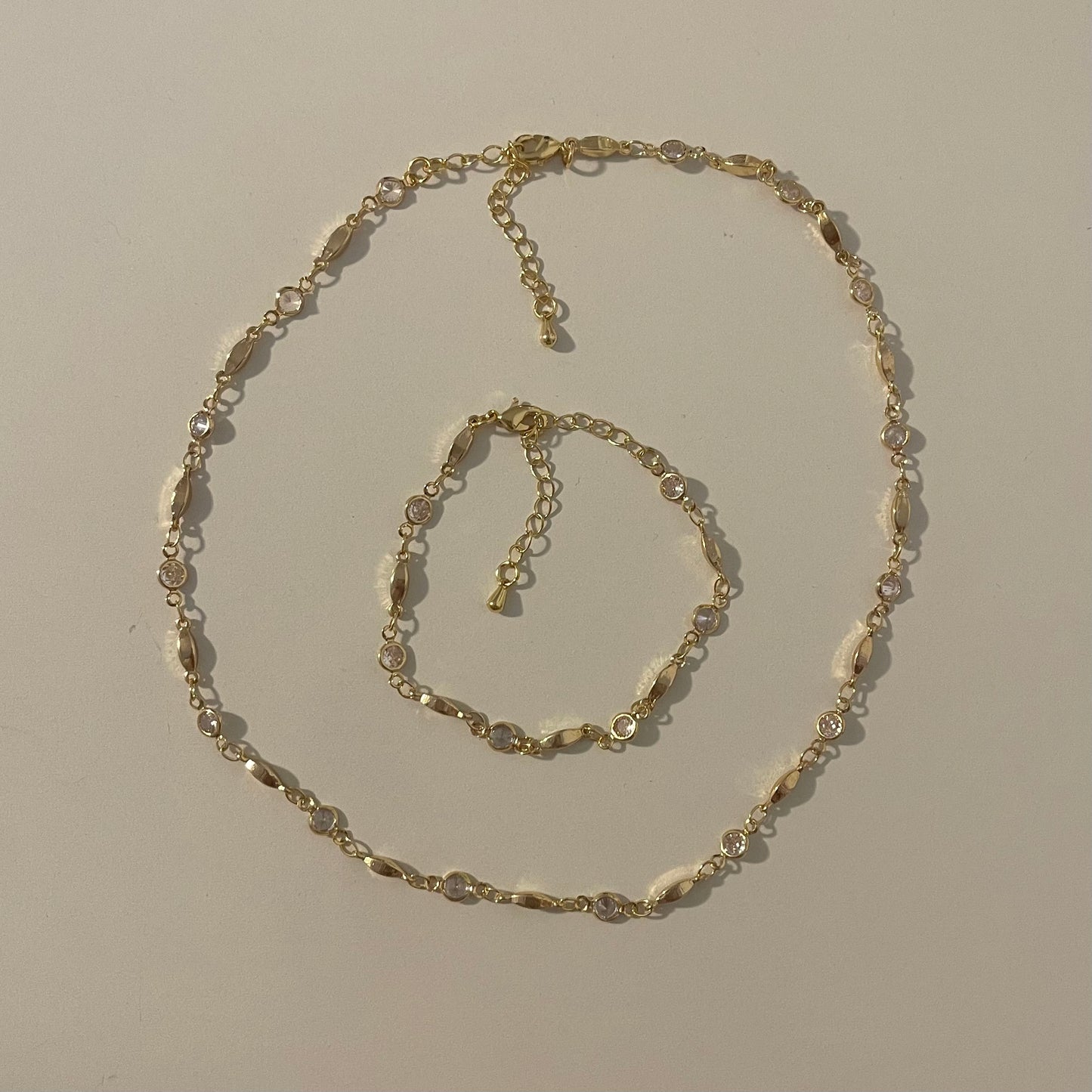 matching gold bracelet & necklace set