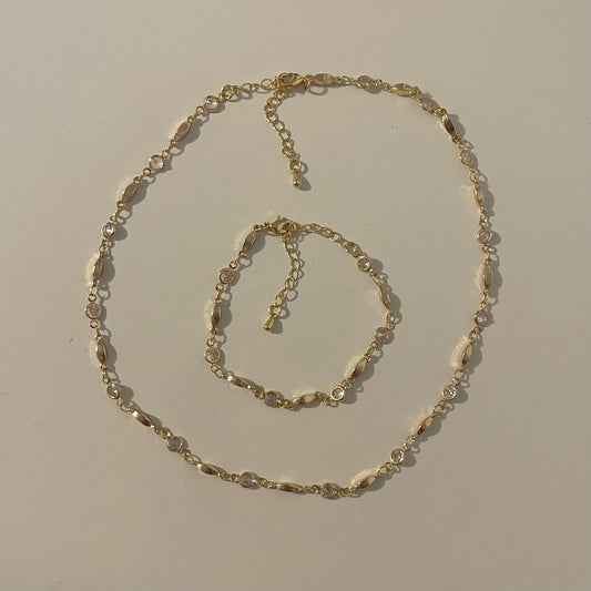 matching gold bracelet & necklace set