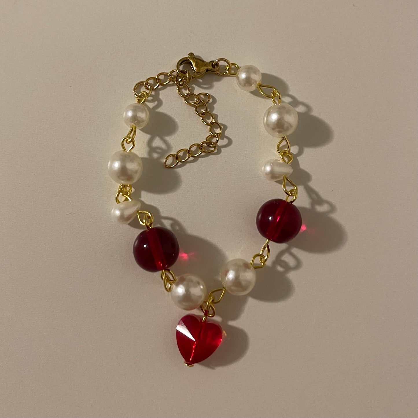 matching golden heart bracelets
